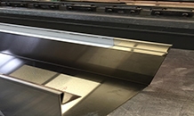 TRAVAUX SUR MESURE D’ACIER INOXYDABLE